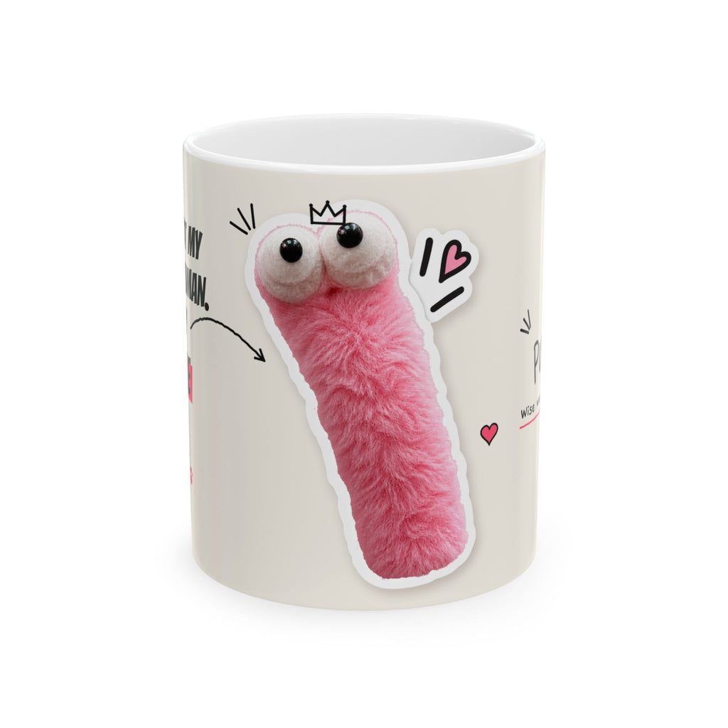 The Pink Sage mug, front: a fuzzy pink Pink Sage with googly eyes and a tiny crown