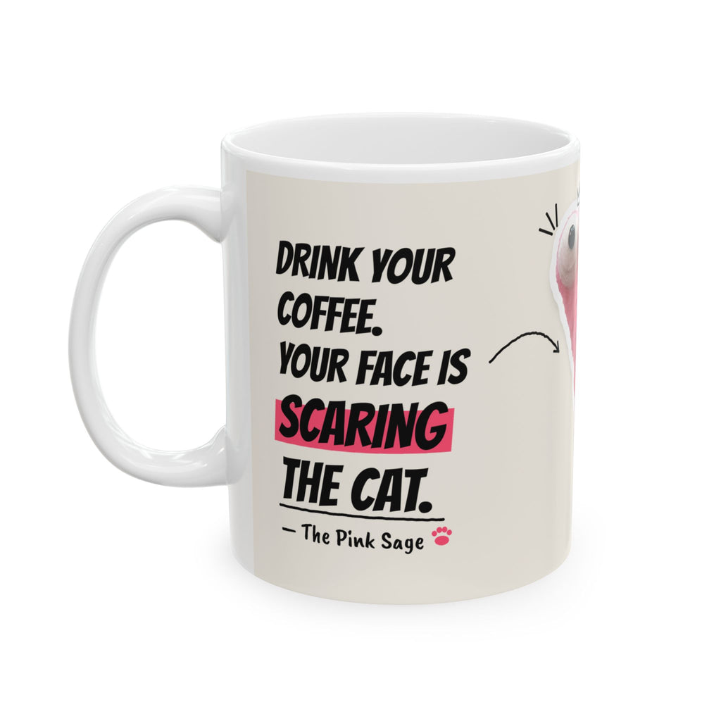 The Pink Sage mug, quote side: Drink your coffee, your face is scaring the cat