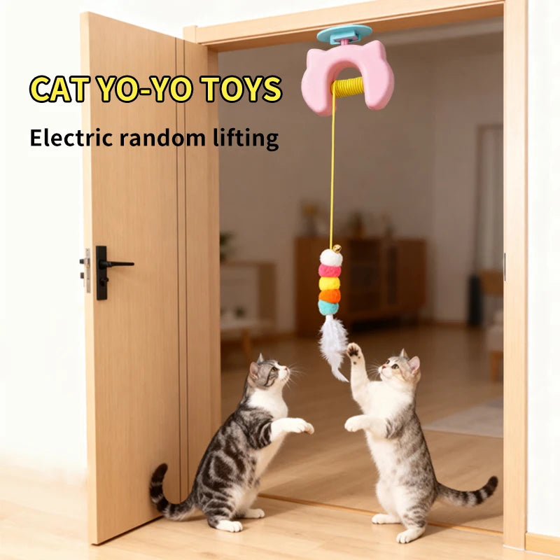 Mugi's Door Yo-Yo in a doorway with two cats jumping at the caterpillar toy