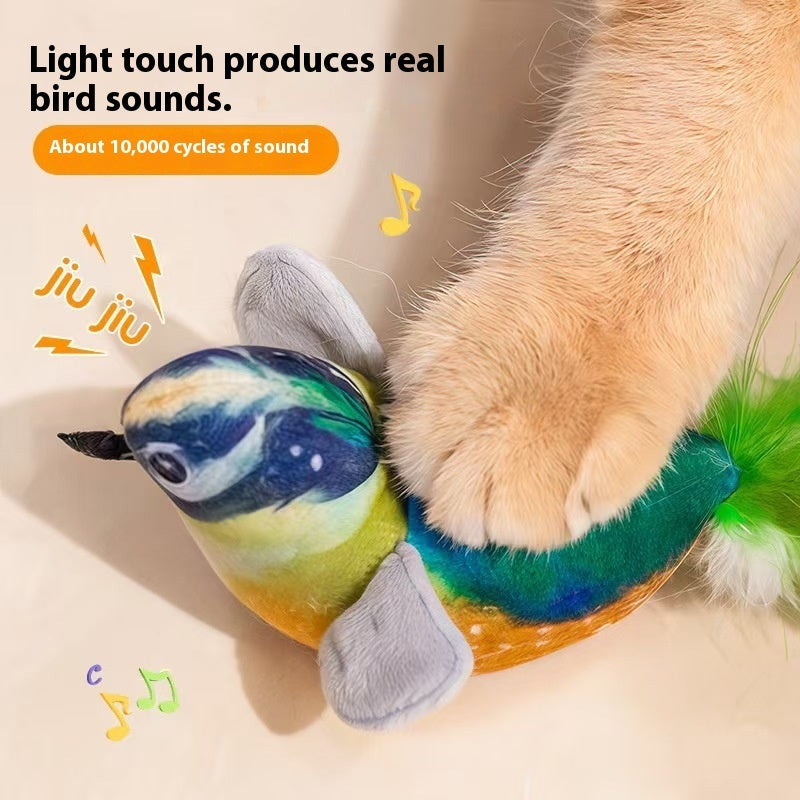 Cat paw tapping the chirping bird cat toy to trigger its bird sounds