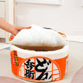 Lifting the fluffy lid on the orange instant noodle cat bed, a nap pod Miso would love