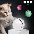 Mugi's Midnight Zoom Ball: LED light-up rolling cat balls with a cat about to pounce