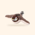 Sparrow flapping bird cat toy with feather tail, chirps when batted, on a clean cream background