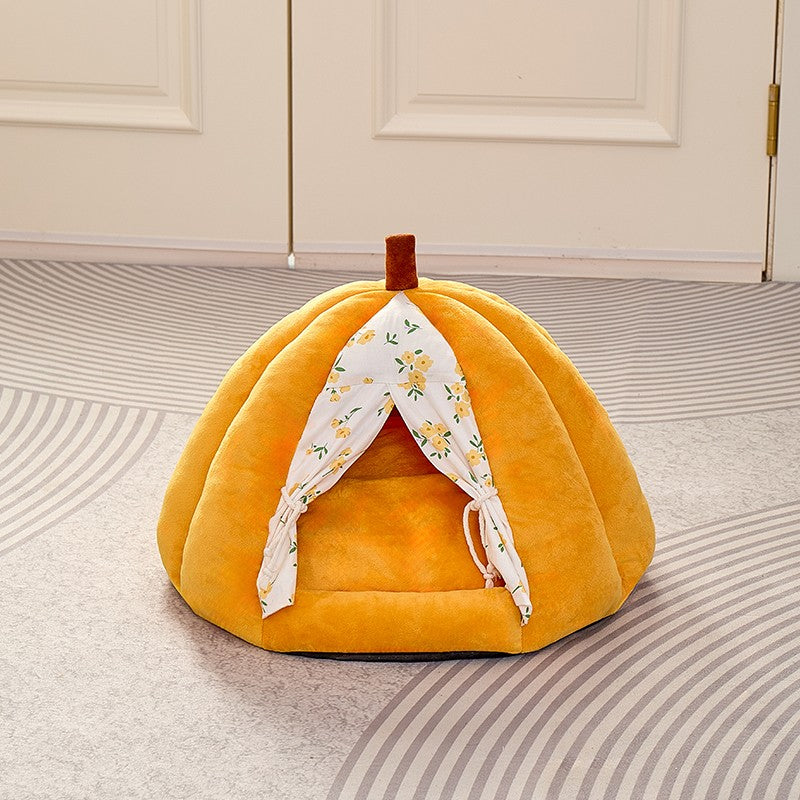 Floral curtain door of the pumpkin cat cave tied open