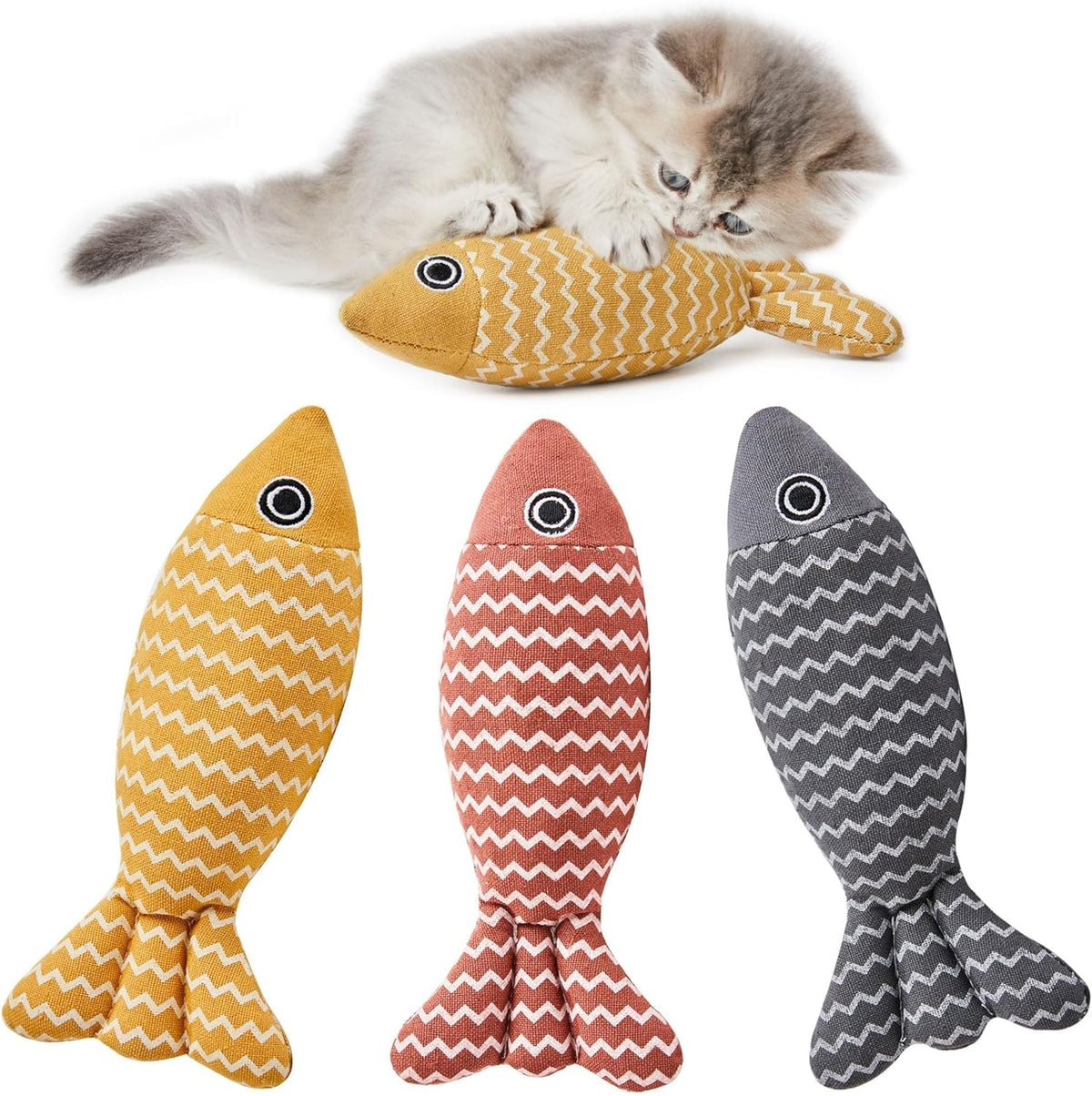 Fluffy kitten hugging a yellow catnip fish kicker, with the yellow, red and gray fish below