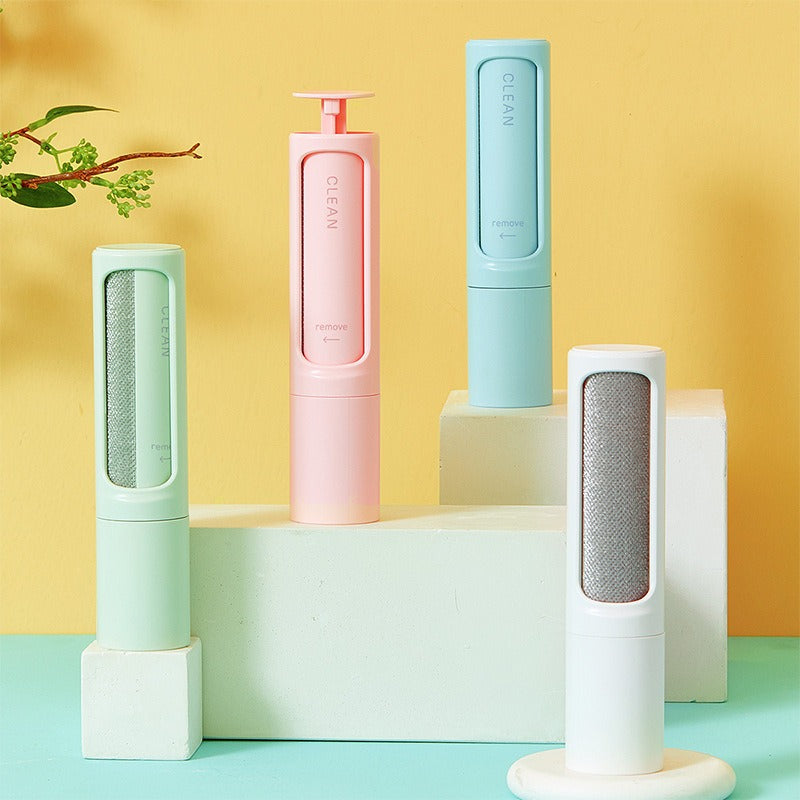 Reusable pet hair remover brushes in green, pink, blue and white
