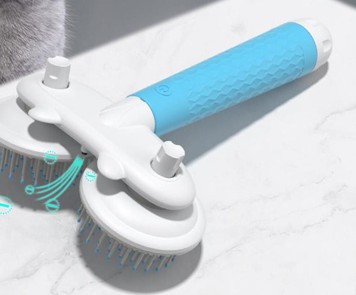 Blue double-head self-cleaning slicker brush for cats with one-button fur release