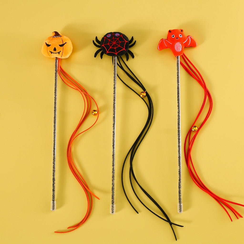Spooky Teaser Wands in pumpkin, spider and bat styles with tassels and bells